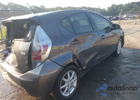 2012 Toyota Prius C Four z USA, uszkodzony, nr VIN JTDKDTB3XC1010507